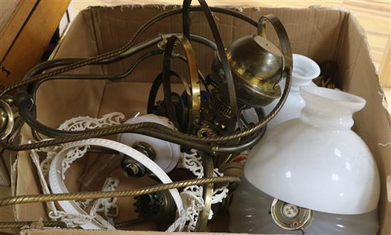 A collection of hanging oil lamps and light fittings